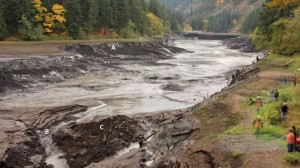 Condit Dam, Washington State. Erosional forms carved when dam emptied: A. Scalloped escarpments; B. Water gap; C. Erosional remnant.