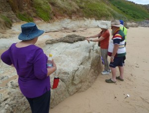 Inspecting granite outcrop at Phillip Island, Victoria.